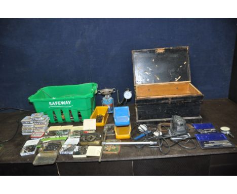 A WOODEN TOOLBOX AND A PLASTIC TRAY CONTAINING TOOLS AND HARDWARE including taps and dies, two draughting sets, punches, scre