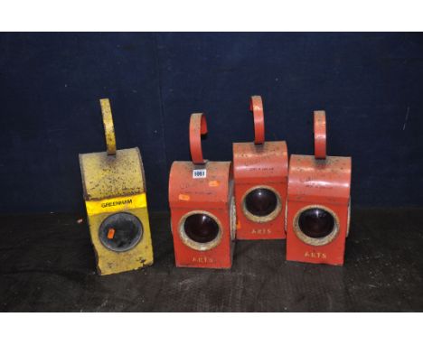 FOUR VINTAGE SIGNAL LAMPS comprising of three Chatwyn in red with four red lenses to each and a yellow Greenham lamp (4)