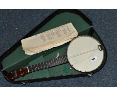 A CASED GEORGE FORMBY UKULELE BANJO, plaque reading 'George Formby, Registered' to headstock, total length 55cm, neck length 