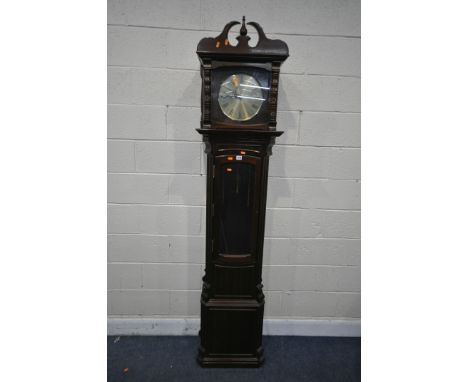 A MODERN MAHOGANY GRANDFATHER CLOCK, with a brassed ten inch dial, with Roman numerals, the top section detaches from the tru