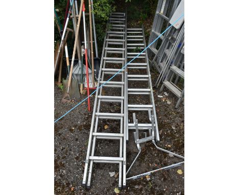 A YOUNGMAN ALUMINIUM 26 RUNG EXTENSION LADDER, a Stairmaster 18 rung extension ladder, and a ladder stand-off (3)