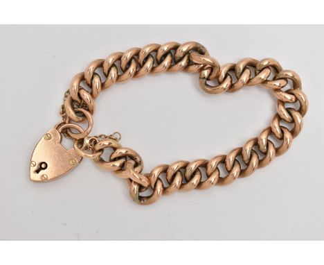 A ROSE METAL CURB LINK BRACELET, hollow links, fitted with a heart padlock clasp, stamped 9ct, engraved 6-8-13, with addition