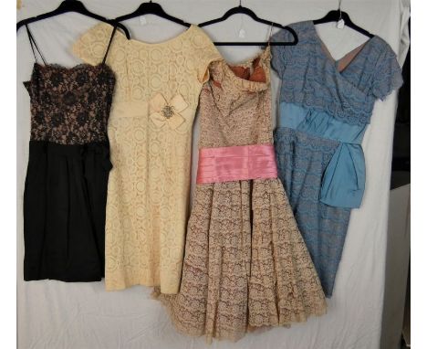 Vintage Fashion: A collection of four vintage lace dresses, c.1950s and later, including: a blue lace short sleeved V-necked 