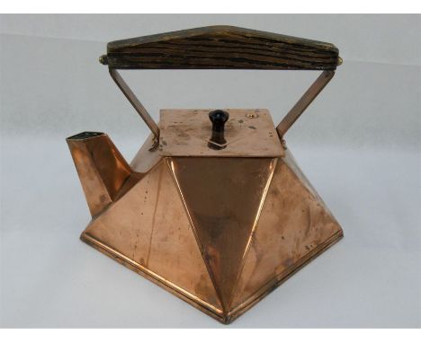 An early 20th Century Art Deco Copper Kettle in the style of Christopher Dresser.  Copper body, wooden handle and bakelite fi