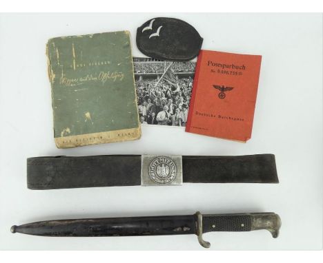 WWII German dress bayonet, army belt with Gott Mit Uns buckle,1943 passport, propaganda book and banknotes.