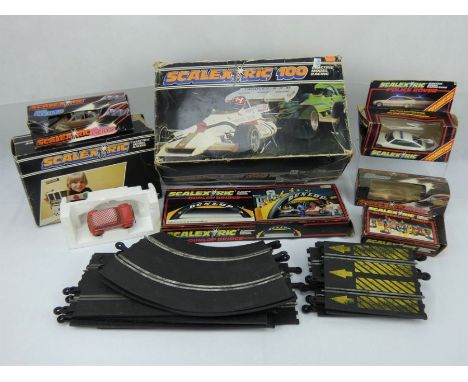 A 1980s Scalextric Yardley BRM kit plus other cars and accessories including track, tyre bridge and Autostart kit.