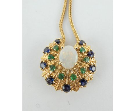 14ct gold peacock style pendant &amp; chain set with sapphires and emeralds around a central white opal. Chain 48cm. Gross we