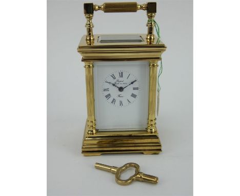 Brand new old stock Rapport French brass cased 8 day miniature carriage clock. Boxed with paperwork and key. Height 11cm



*