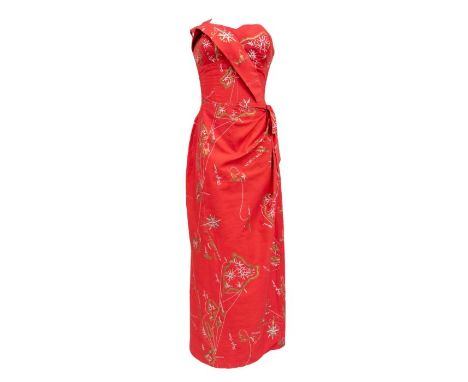 Vintage Fashion: A vintage Alfred Shaheen, Honolulu dress, c. 1950s, in red heavy cotton, decorated with a Hawaii inspired mo