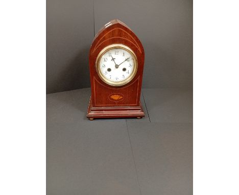 An 8 day mantle clock in inlaid mahogany case by Waterbury Clock Co USA stamped patent date on movement Sept 13 1898