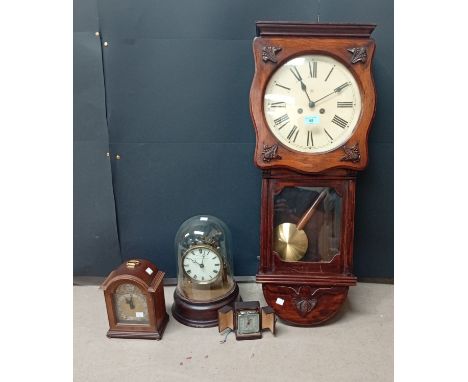 A selection of clocks including a Junghans wall clock, a Eureka Clock Co London 1000 day electric clock, a Thwaites and Reed 