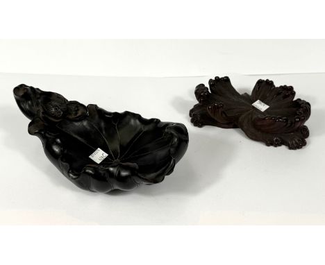 An unusual Chinese carved Zitan coloured floral display piece with assosaited carved wooden stand