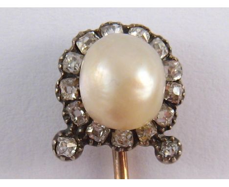 A certificated natural pearl and diamond stick pin, accompanied by Gem & Pearl Laboratory report number 10500 stating “Natura