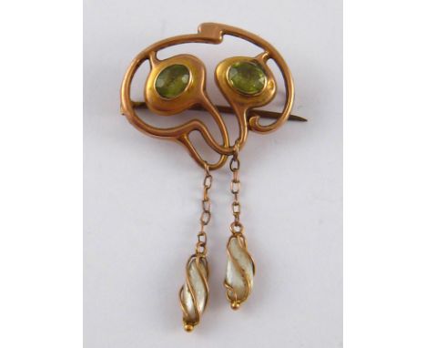 Barnet Henry Joseph. A 9 carat gold, freshwater pearl and peridot Art Nouveau brooch, marked B.H.J. and 9ct, approx 5 x 3cm, 