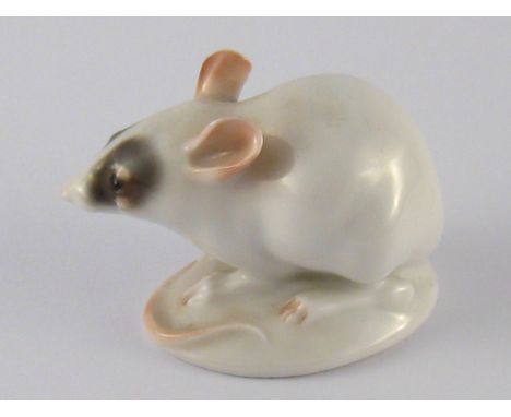 A Rosenthal ceramic figure of a white mouse, impressed W, green floral Rosenthal Bavaria backstamp. Ht.3.5cm.