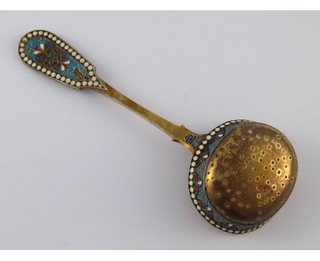 A Russian silver gilt cloisonne enamelled sifter ladle, assay mark only, Moscow 1908-1917. length 16cm. wt. 64gm. 