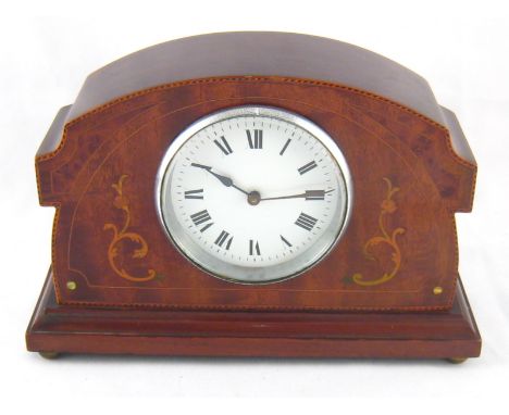 An Edwardian inlaid mahogany mantel clock with white enamel dial and French movement.  ht.16cm. 