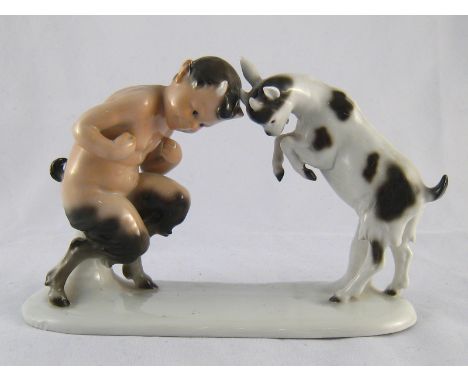 A ceramic group of a young satyr locking horns with a young goat, the base incised on the top “Gustafsson”, impressed and blu