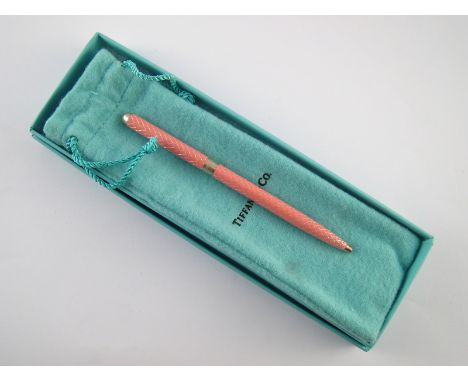 A lady's Tiffany silver ballpoint pen in pink enamel with silver cloison latticework. In protective pouch. 