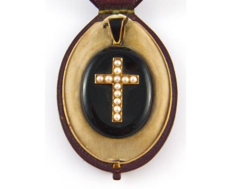 An antique onyx, gold and seed pearl pendant, locket back missing, approx 5 cm, in original fitted case marked “London & Ryde