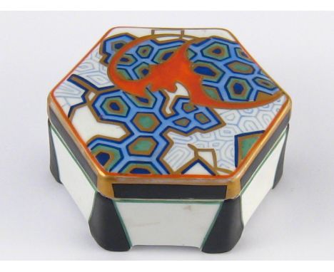 A Kurt Wendler Art Deco style ceramic hexagonal box by Rosenthal, the sides in black and white, the lid a mosaic design, with