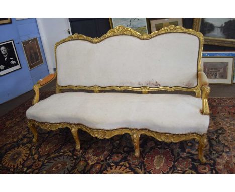 Large gilt wood framed sofa with triple arched back and serpentine front, 200cm wide