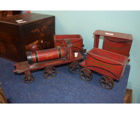 Early 20th Century painted wooden train set with engine and tender and two trucks