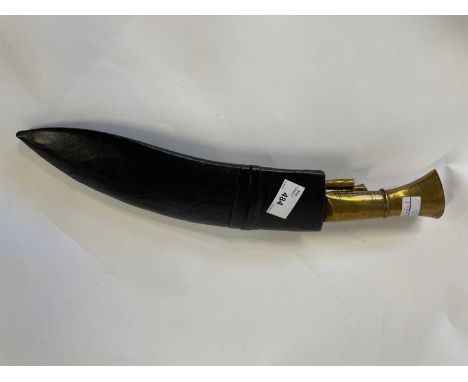 Kukri knife with brass handle in leather scabbard the scabbard with two smaller examples