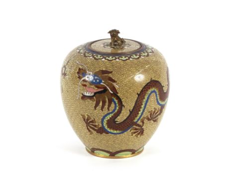 A Chinese cloisonne baluster vase and cover, surmounted by a Kylin finial and profusely decorated dragons and foliage, 17.5cm