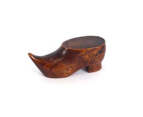 A 19th Century treen snuff box,&nbsp;in the form of a boot with swing lid, 10cm long