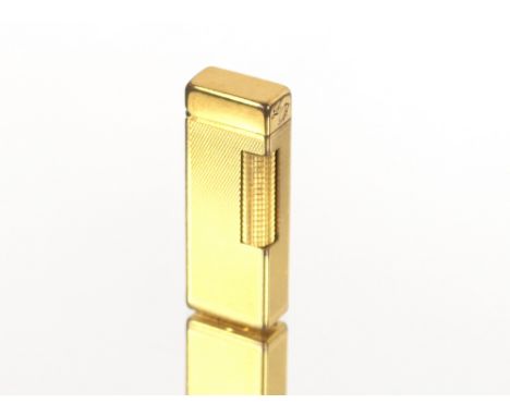 A Dunhill cigarette lighter, bearing initials L.B.