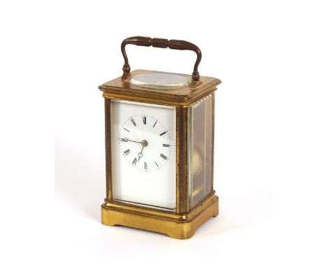 A brass cased carriage clock, 15cm high
