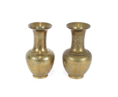 A pair of Chinese brass baluster vases, having floral engraved decoration, seal marks to bases, 20cm high