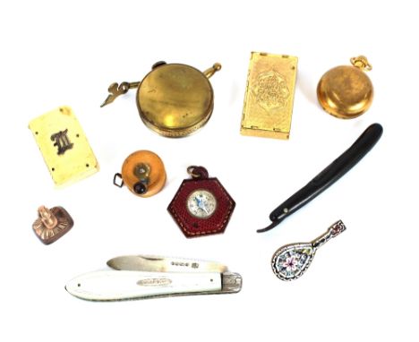 A Victorian silver bladed and mother of pearl handled folding knife; a miniature cut-throat razor; a bone Vesta case; a brass