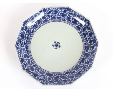 An Antique Chinese decagonal floral decorated shallow bowl, under-glazed blue seal mark to base, 20cm dia.