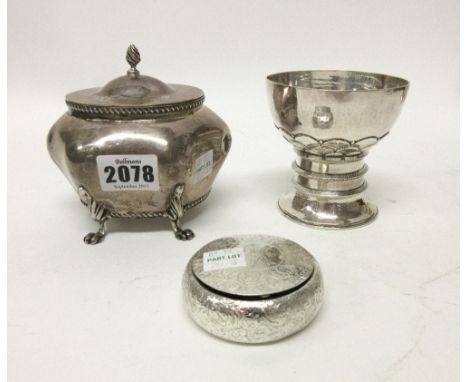 A silver tea caddy decorated with gadrooned rims, the hinged lid with wrythen knop finial and raised of four paw feet, Birmin