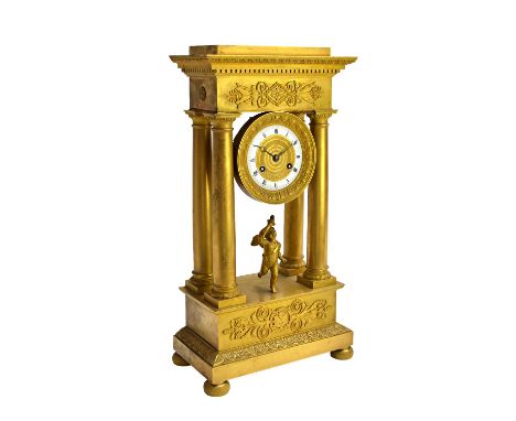 A Louis Philippe ormolu striking portico mantel clock, Destape, Paris, mid-19th century, with enamel and engine turned dial f