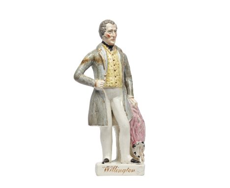 A Staffordshire portrait figure of Arthur Wellesley, Duke of Wellington, 19th century, polychrome painted on a gilt titled ba