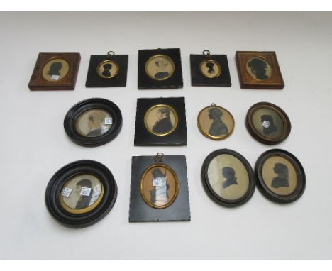 A pair of Victorian silhouette portrait miniatures of opposing boy and girl, another pair in gilt metal frames, six further s