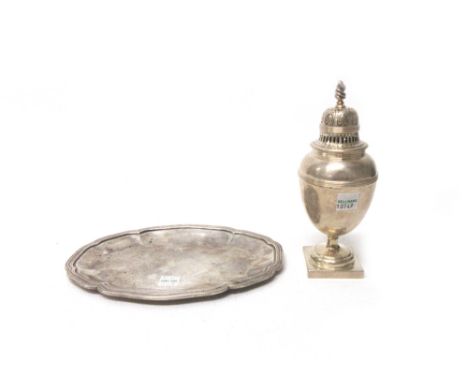 A silver sugar caster, having a wrythen knop finial, raised on a square base by Goldsmiths and Silversmiths Ltd, London 1915,