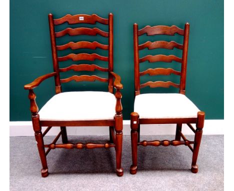 A set of eight 18th century style Lancashire wavy ladder back dining chairs on turned supports, to include a pair of carvers 