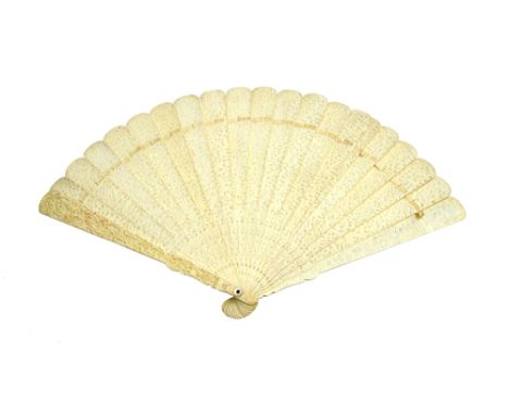 A Cantonese carved and pierced ivory fan, late 19th /early 20th century, detailed all over with figures against a blossoming 