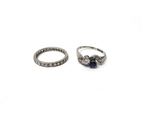 A diamond set full eternity ring, mounted with circular cut diamonds, ring size M and a half and a diamond and sapphire ring,