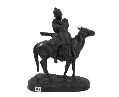A black painted metal equestrian model of a Russian hunter, early 20th century, on horseback embracing a young woman, raised 