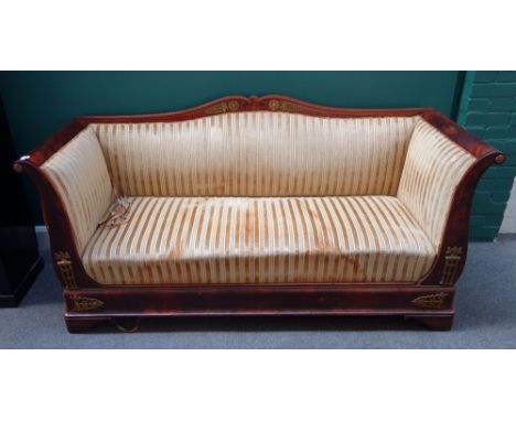 A Biedermeier gilt metal mounted mahogany scroll end sofa, 193cm wide x 95cm high.