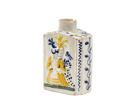 A Pratt ware 'Macaroni' tea caddy, late 18th/early 19th century, relief moulded with figures and polychrome decorated against