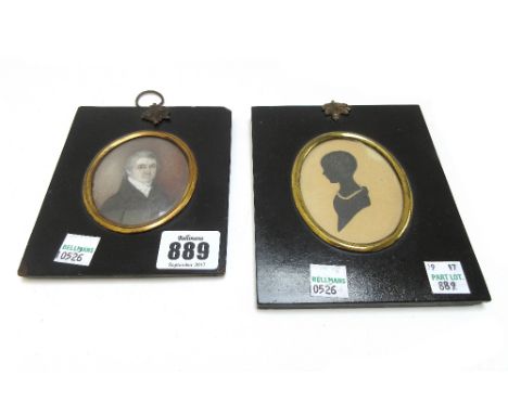 An early 19th century portrait miniature on ivory of a gentleman and a silhouette of a young girl, both framed and glazed, 7c