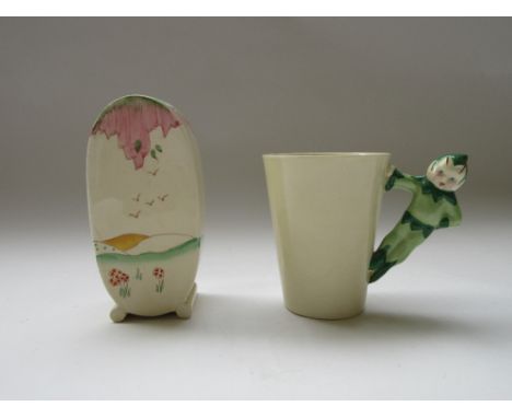 A Clarice Cliff Bonjour sugar sifter, 1930's, decorated with the `Taormina' (pink), pattern, black printed marks, 13cm. high;