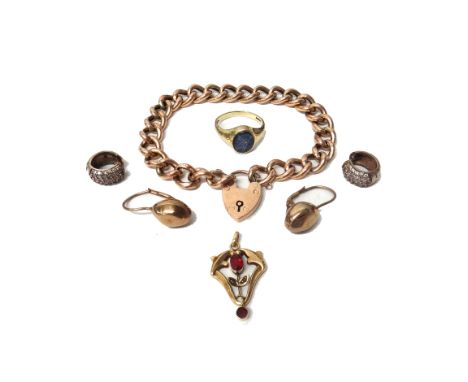 A gold curb link bracelet, with a gold heart shaped padlock clasp, detailed 9 CT, weight 9.6 gms, a 9ct gold ring, mounted wi