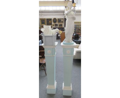 A pair of Hopper style plaster figures modelled as Diana and companion, white and turquoise, incised to the base 'March 6 - 1